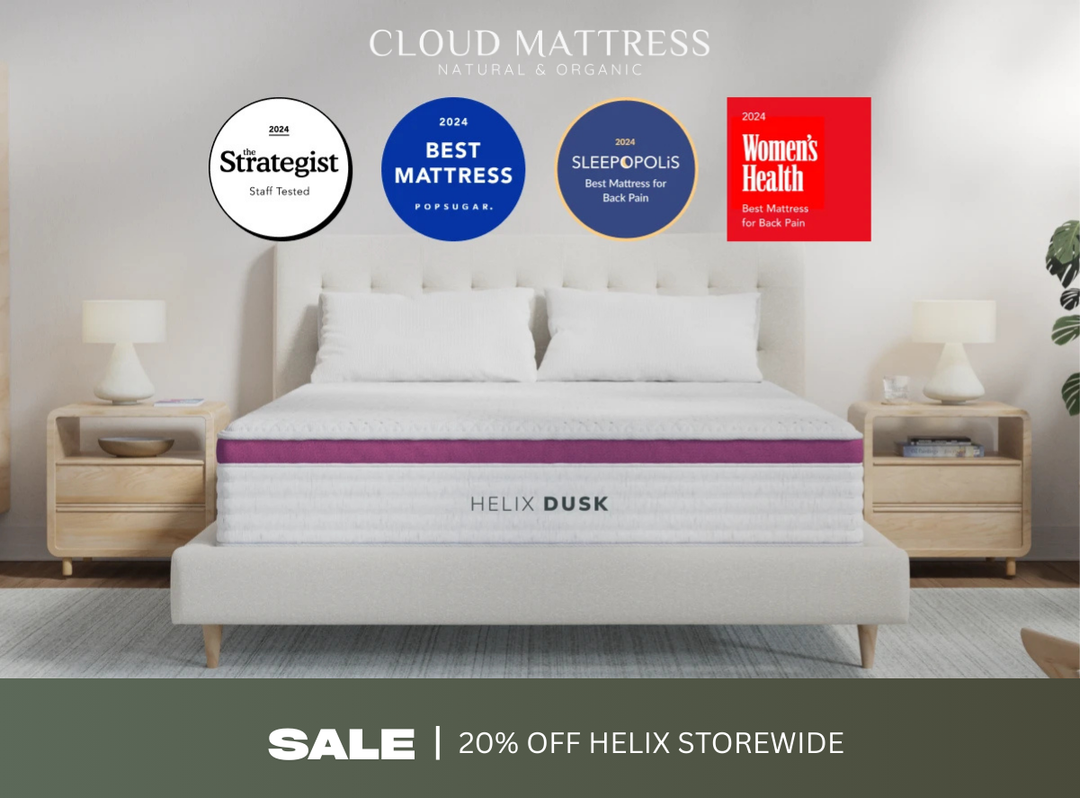 Helix Dusk mattress on a bed with multiple awards displayed above it, in a bedroom setting.